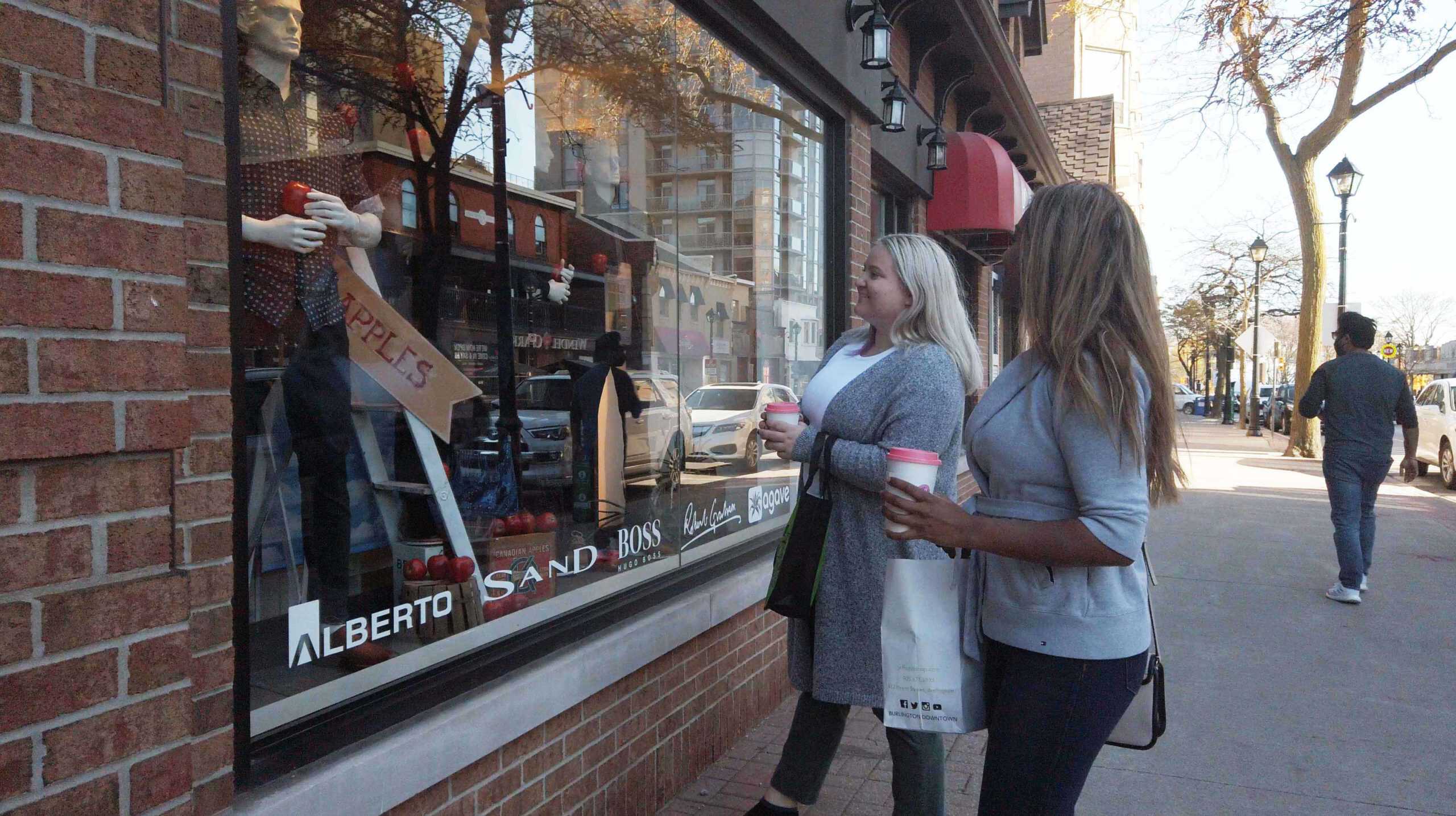 Ladies window shopping in downtown Burlington