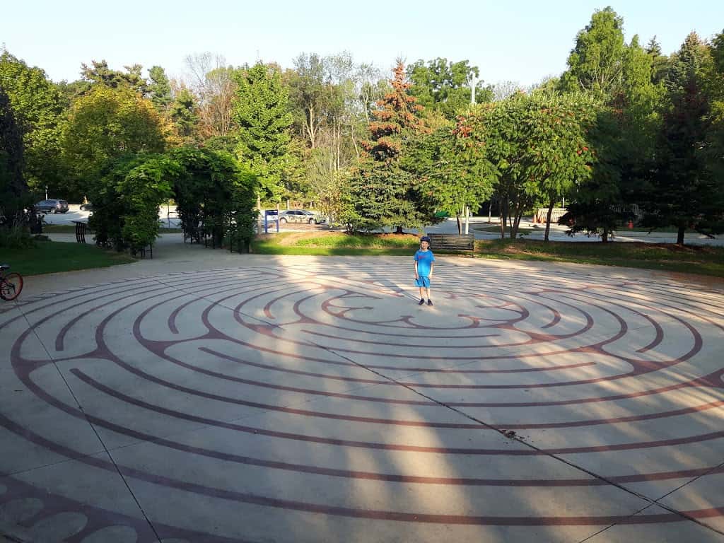 Boy walking Central Park Labyrinth