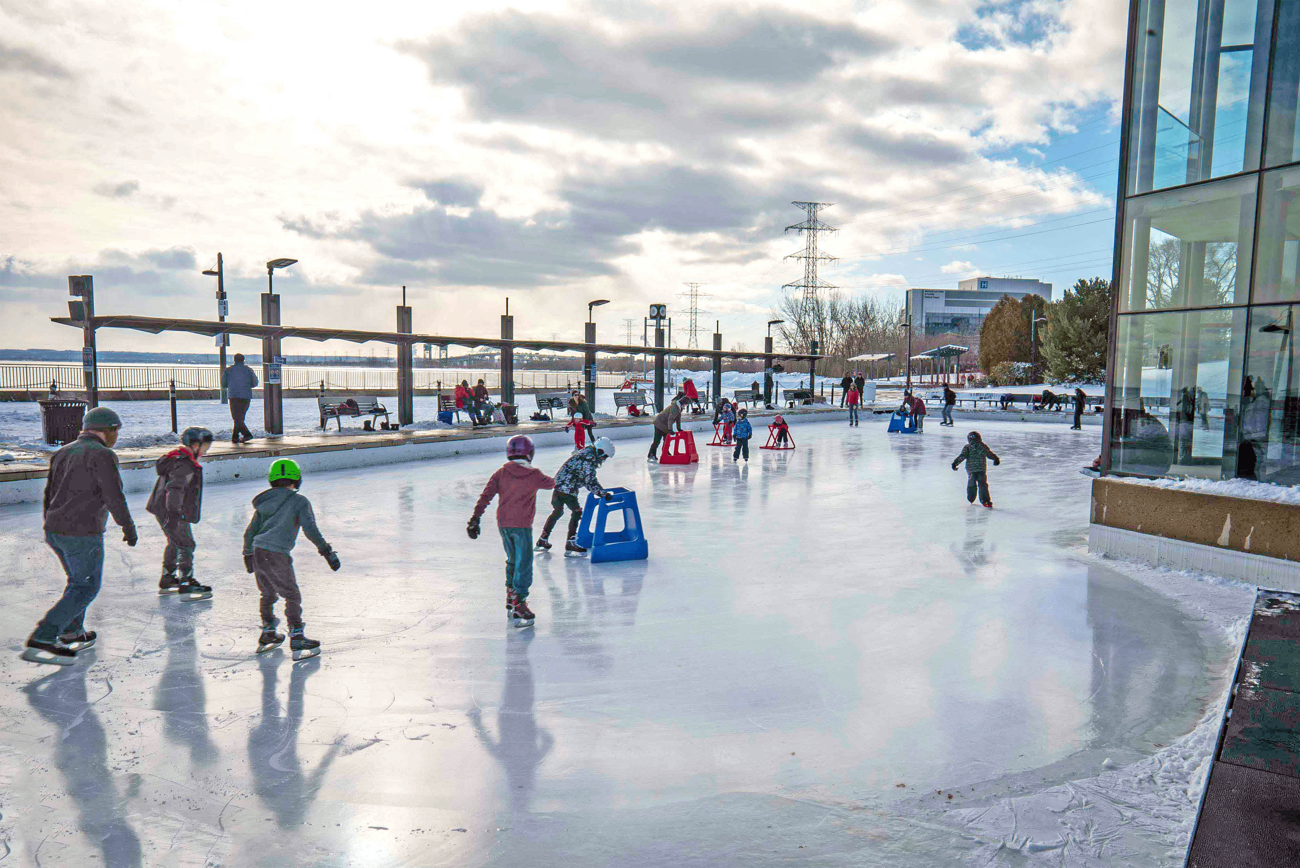 Kids ice skating in snow
